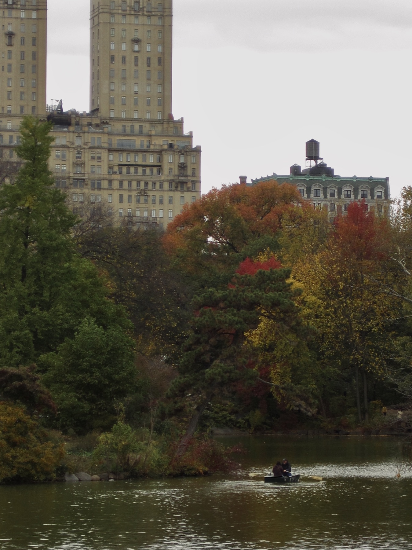 A rowboat below the San Remo and a water tower