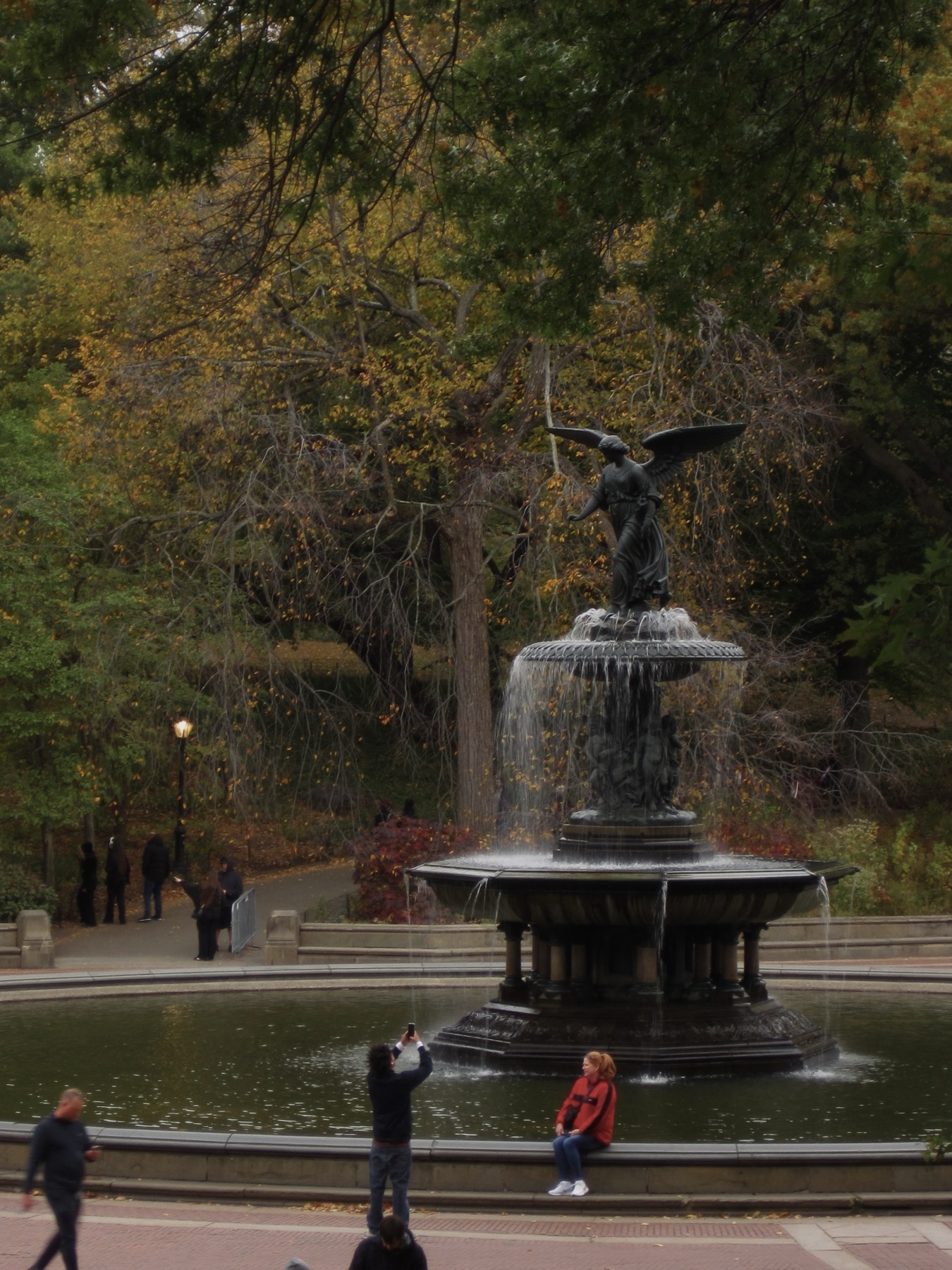 Bethesda Fountain and its angel among autumn trees — Central Park in Late October