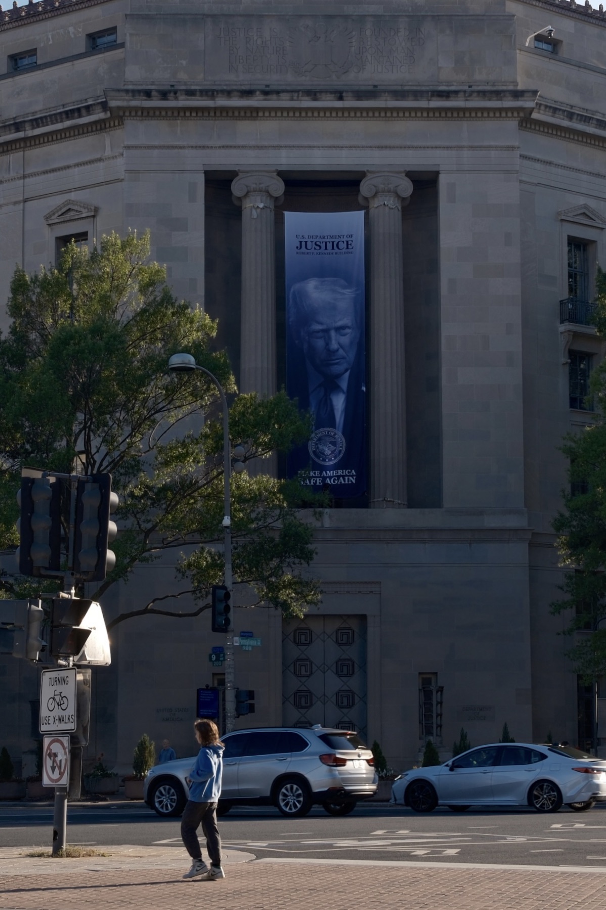 A banner over the avenue in long light