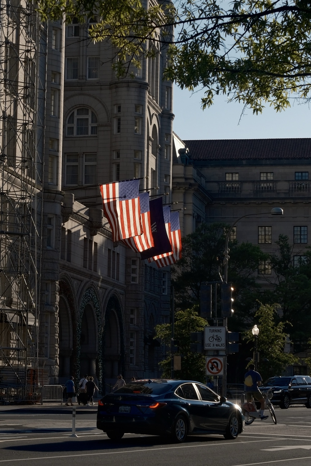 Flags catching the last sun by the old tower