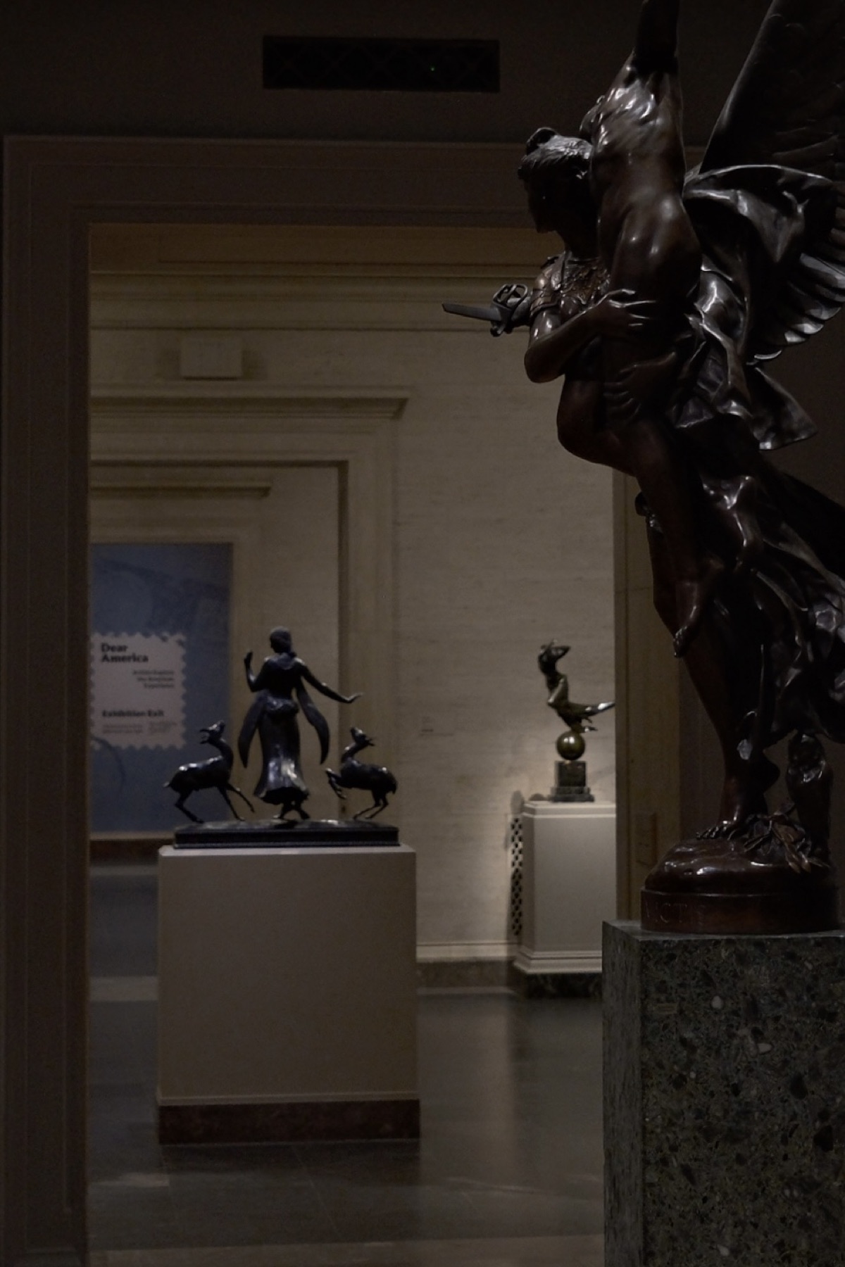 Bronze figures keeping company across the sculpture rooms
