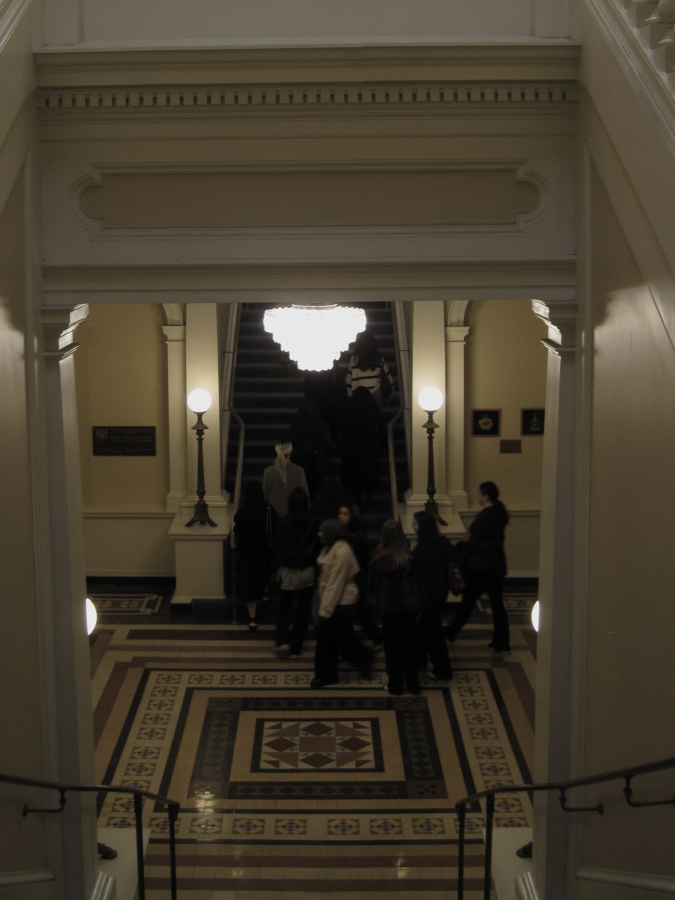 The entrance hall with its mosaic floor and staircase